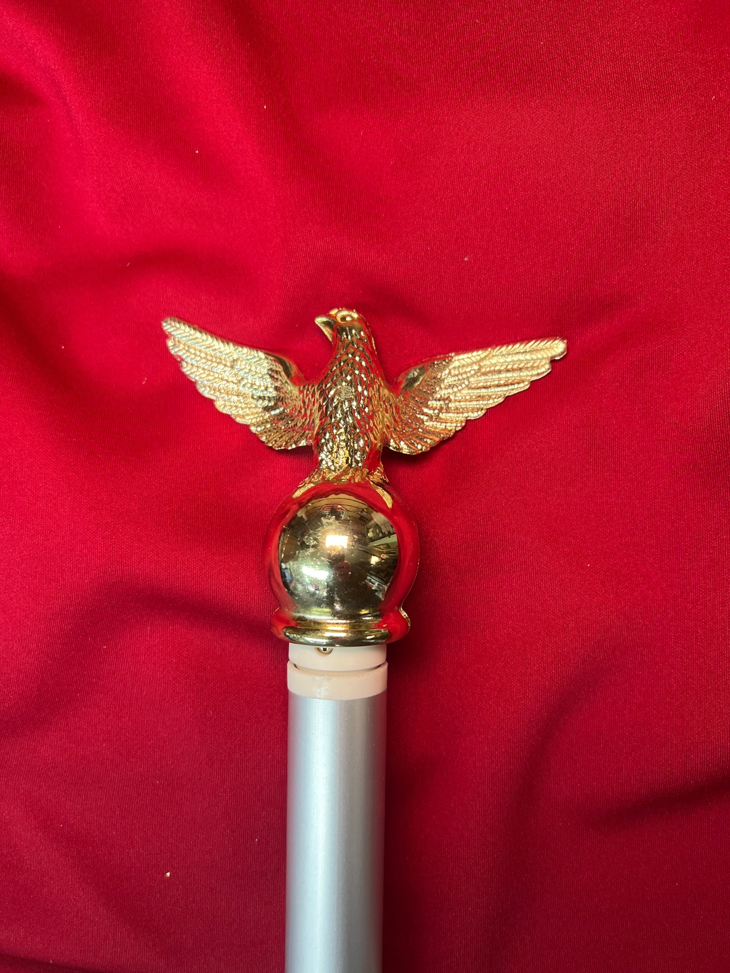 Eagle top for spinner poles